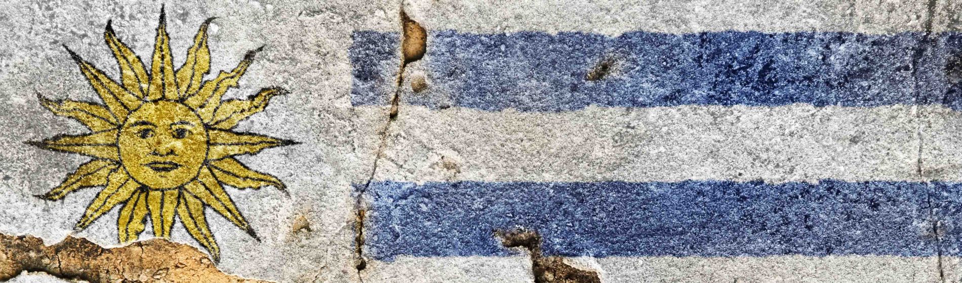 flag_of_uruguay_on_the_old_wall_cement.jpg