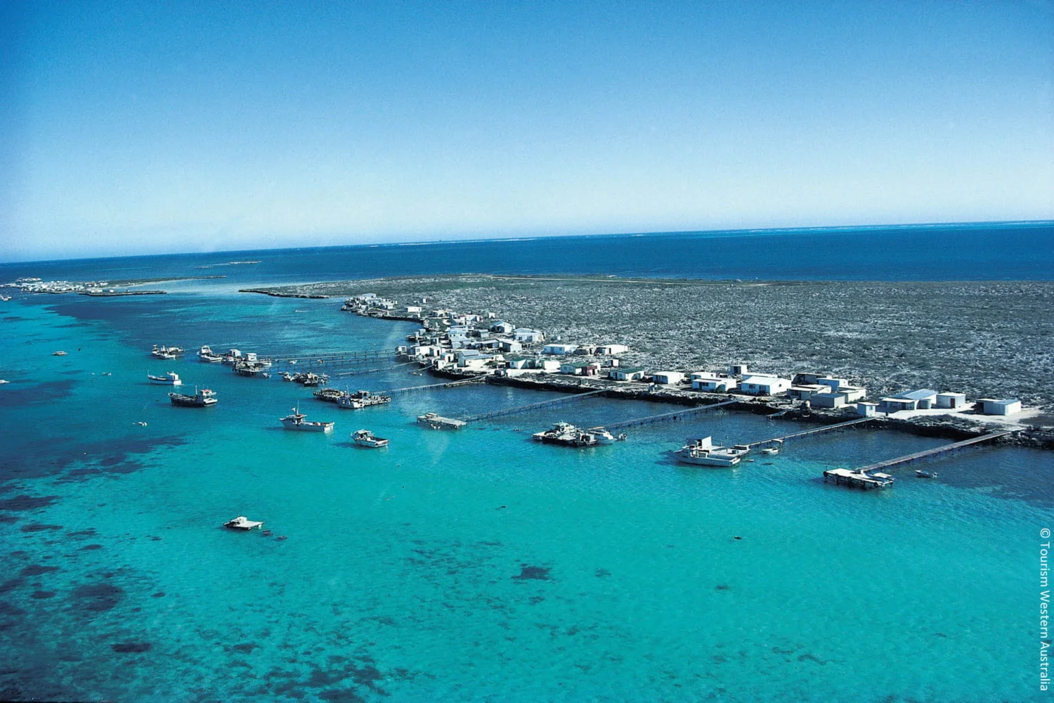 Aerial view of fishing shacks Abrolhols Islands