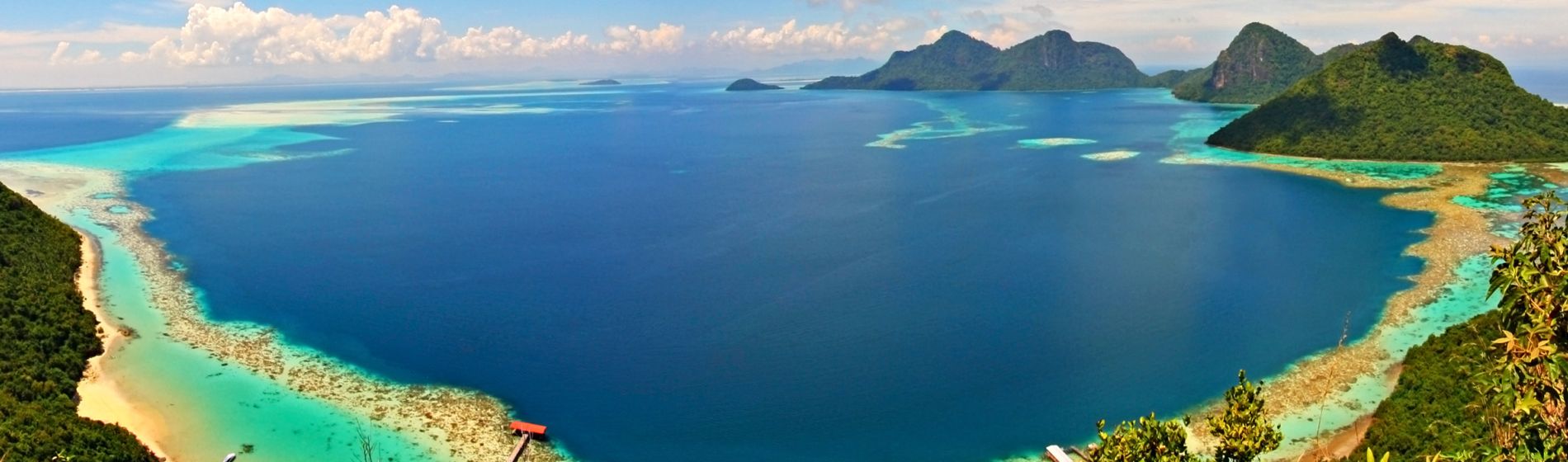 ring_of_corals_seen_from_the_peak_of_bohey_dulang_island_sabah_malaysia.jpg